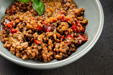 Lentil dish vegetables and roasted peppers savory vegetable fresh vegetarian and vegan food gourmet food background on the table rustic food top view copy space keto and paleo diet