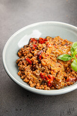 Lentil dish vegetables and roasted peppers savory vegetable fresh vegetarian and vegan food gourmet food background on the table rustic food top view copy space keto and paleo diet