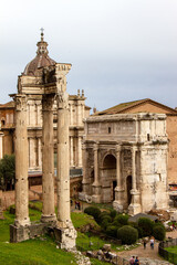 Obraz premium Picture of the Temple of Castor and Pollux and the Temple of Concord in the famous Roman Forum. The Palatine Hill, Rome, Italy.