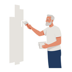 Elderly man painting wall and holding paint bucket  