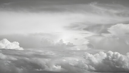 Monochrome cloudscape wallpaper background with fluffy clouds and overcast sky view