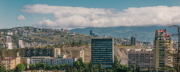 Fototapeta premium Tbilisi City Skyline with Mountain Background, Georgia