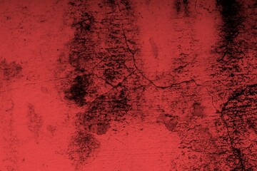 Red background, Rough textured red wall with visible cracks and dark abstract patterns, ideal for...