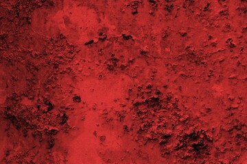 Red background, Rough textured red wall with visible cracks and dark abstract patterns, ideal for...