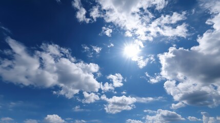 Fototapeta premium Bright Sunlight in Clear Blue Sky with Fluffy White Clouds and Open Space