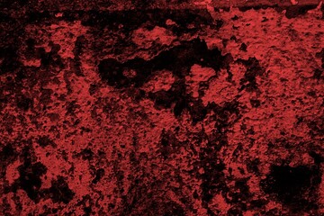 Red background, Rough textured red wall with visible cracks and dark abstract patterns, ideal for...