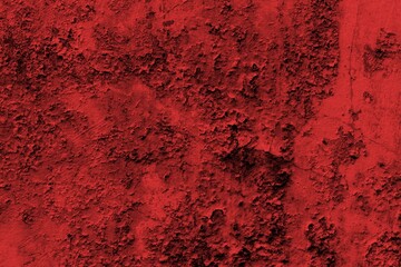 Red background, Rough textured red wall with visible cracks and dark abstract patterns, ideal for...