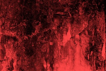 Red background, Rough textured red wall with visible cracks and dark abstract patterns, ideal for...