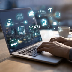 Obraz premium IoT Concept. Internet of Things. A person working on laptop with digital icons representing the Internet of Things (IOT), showcasing modern technology and connectivity in a digital environment.