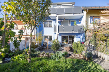 Charming residential house Real estate in Germany captured on a sunny summer day. garden, green...