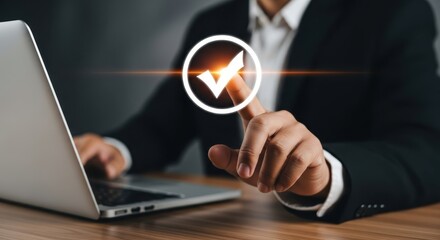 Photo of a businessman touches a glowing checkmark on a digital interface, symbolizing successful completion and verification of a task