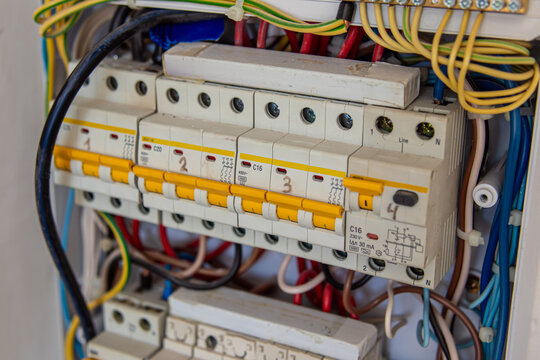 Electrical panel with circuit breakers and wiring. Soft focus. Residual current devices