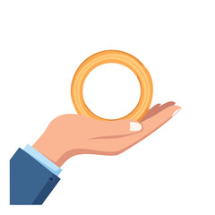 An open hand gently presenting an onion ring. The image captures a person holding an object that is round and made of gold. 