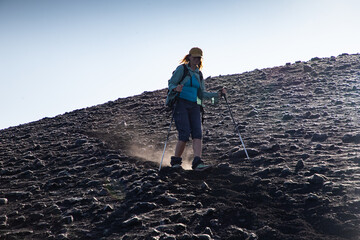 hiker trekking on mount Etna