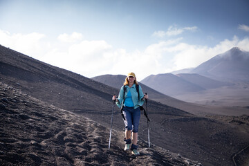 hiker trekking on mount Etna