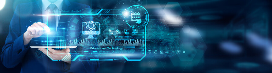 EdTech Consultant - CIO using tablet analyzing Educational Technology platform usage analytics and VR adoption rates, personalized learning ROI. Digital literacy benchmarks.