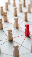 Obraz premium Wooden figures connected by red lines people connection