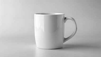 Fototapeta premium A plain white ceramic mug isolated on white background
