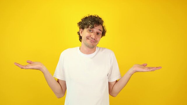 Confused young man, shoulders up - can't help, makes gesture of I dont know. Difficult question, guilty reaction, puzzled stylish guy on yellow background. support campaigns, FAQ banner, Mental Health