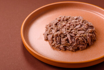 Tuna, canned fish in a can and on a plate for making sandwiches and other food. Canned tuna