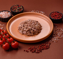 Tuna, canned fish in a can and on a plate for making sandwiches and other food. Canned tuna
