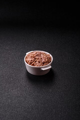 Tuna, canned fish in a can and on a plate for making sandwiches and other food. Canned tuna