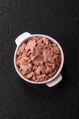 Tuna, canned fish in a can and on a plate for making sandwiches and other food. Canned tuna