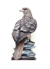 ceramic eagle figurine isolated on white background