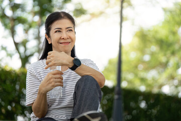 Seniors embracing hydration and joy during outdoor activities