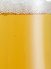 Beer. Light beer with bubbles and foam background