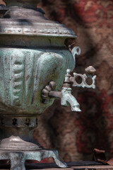 Fototapeta premium A close-up of an antique copper samovar with intricate details, exuding vintage charm.