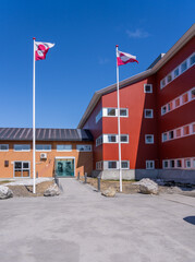 Glass doors and entrance to Parliament or Inatsisartut in the capital city of Nuuk in Greenland © steheap