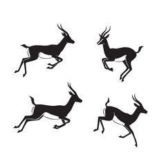 Obraz premium Four black antelopes running across white jumping leaping