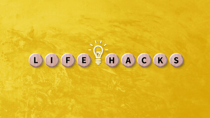 Life hacks motivational phrase concept, Life hacks word written on wood block are shown as business...