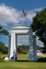 Peace Arch Historical State Park. The International Peace Arch is a 67-foot dramatic white arch that rises from the green lawns and flowering gardens on the U.S.-Canada border at Blaine.
