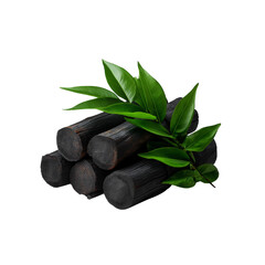 Black bamboo charcoal with bamboo shoots and green leaf isolated on white background