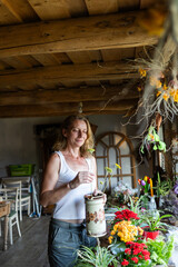 woman working in her flower shop