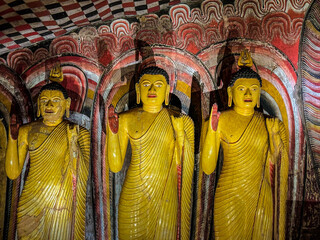 Interior of the second Cave of the Great Kings (Maharaja Viharaya), standing Buddha, Dambulla Cave temple, Sri lanka