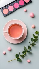 Aesthetic makeup flatlay with blush palette tea cup and eucalyptus for beauty blog