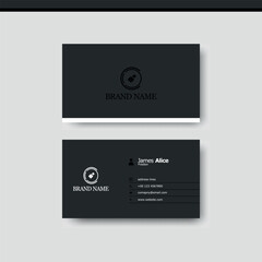 Elegant dark business card design featuring a brand logo and contact details for professional networking purposes.