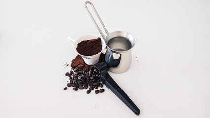 Turkish Coffee, Beans and Powder on White Background