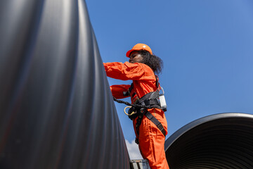 Industry Engineers Walking Inside Circular water Pipe. Engineering or Worker inspection pipe...