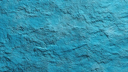 Vibrant azure stucco texture displaying natural patterns and abstract surface design, perfect for backgrounds and artistic projects