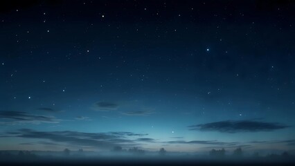 Naklejka premium Starry night sky with deep blue hues, twinkling stars, and atmospheric clouds over a distant horizon.