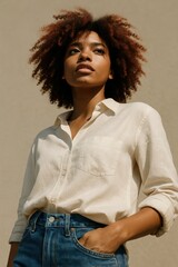 Confident young african female in casual shirt with natural hair outdoors