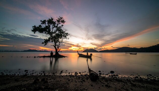 Serene Sunset over Tropical Bay with Lone Tree and Boats