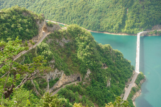 panoramic view of Piva lake near the city of Pluzine and road M18 in Montenegro, Europe