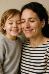 Caucasian female adult with child smiling together in warm embrace