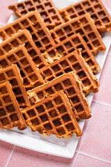 Belgian Waffles Cut Into Triangles on Serving Platter