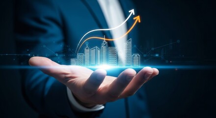 Fototapeta premium A businessman holds a digital cityscape with upward trending arrows symbolizing growth